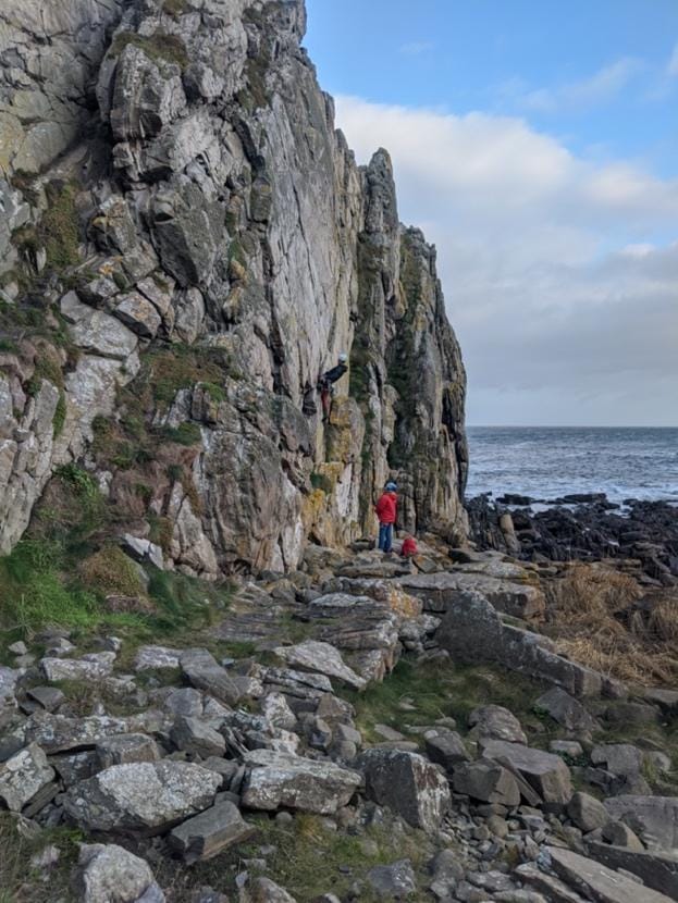 A rocky beach
Description automatically generated