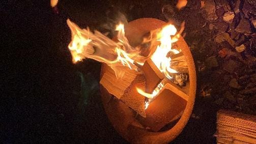 A picture containing nature, fire, candle, lit
Description automatically generated